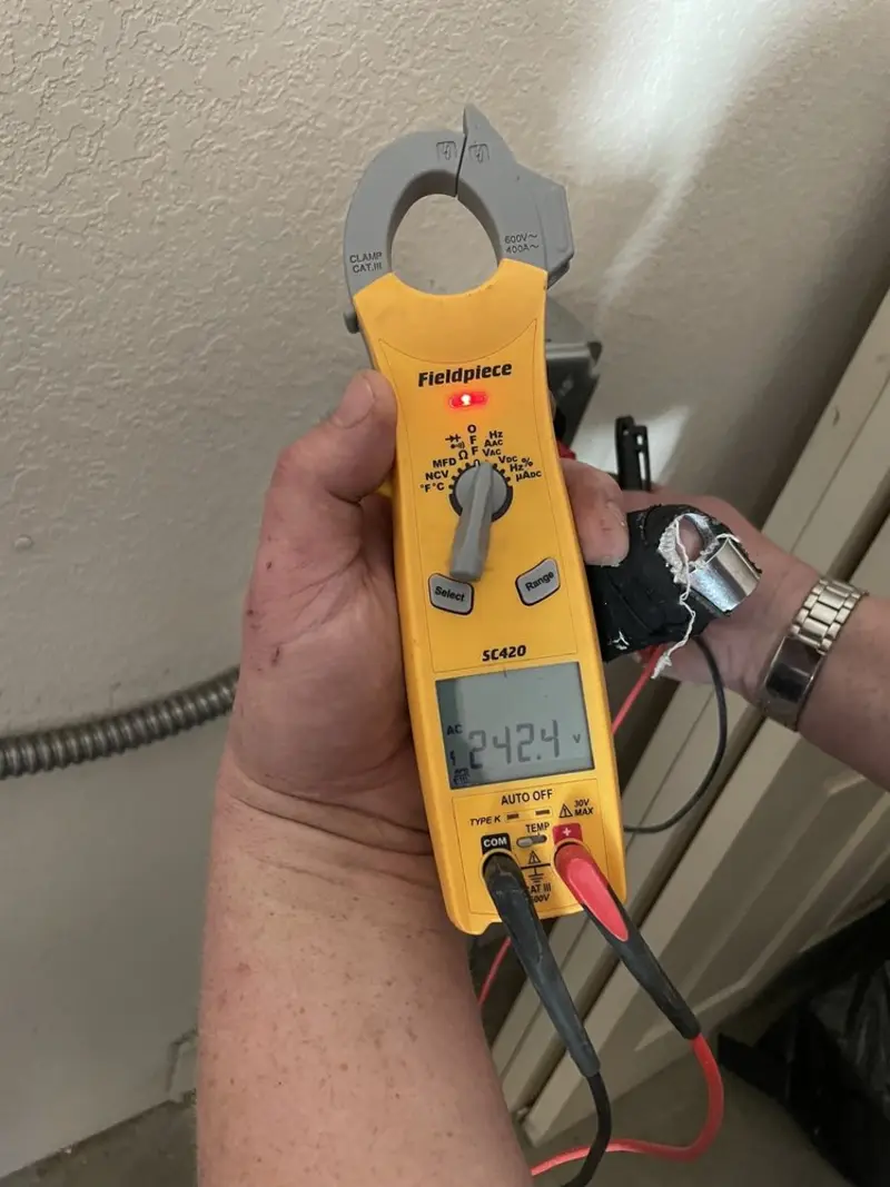 Voltage testing with clamp meter during Hot Tub / Pool Electrical Wiring in Montpelier